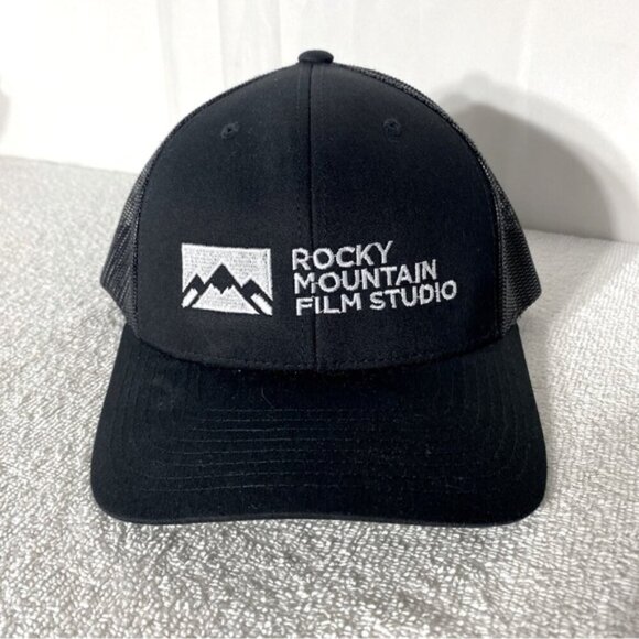 The Classics Rocky Mountain Film Studio Black Mesh Back Snap Back Trucker Hat - Picture 1 of 10